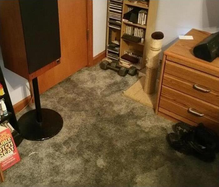 Carpet floor of a bedroom wet